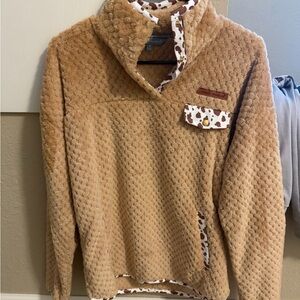 Cozy Tan Fleece Pullover with Cow Print Accents